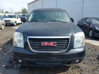 2014 GMC Yukon XL SLT with VIN 1GKS2KE77ER199723, listed as a IAAI auction lot 41555112 with 215,436 mi miles. Bid and sale history available at carsss.com. Image 12.
