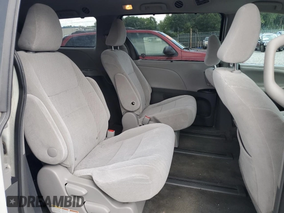 2017 Toyota Sienna LE with VIN 5TDJZ3DC3HS171060, listed as a Copart auction lot 65908415 with 108,082 mi miles and Salvage title. Bid and sale history available at DreamBid. Image 11.
