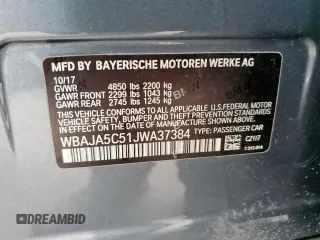 2018 BMW 5 Series 530i z VIN WBAJA5C51JWA37384, wystawiony jako Copart lot #55061215 z przebiegiem 113 809 mil mil oraz Szkody całkowita. Historia ofert i sprzedaży dostępna na DreamBid. Obrazek 12.