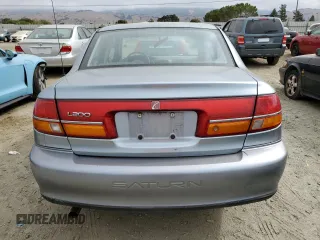 2002 Saturn LS z VIN 1G8JU54F32Y529705, wystawiony jako Copart lot #71895554 z przebiegiem 60 088 mil mil oraz Szkody całkowita. Historia ofert i sprzedaży dostępna na DreamBid. Obrazek 6.
