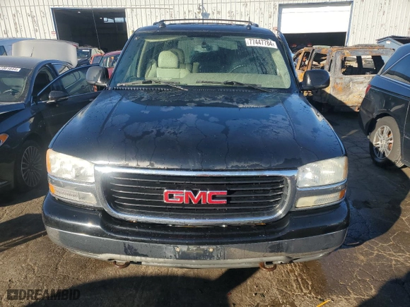 2005 GMC Yukon SLT with VIN 1GKEK13T05J107678, listed as a Copart auction lot 77447784 with 269,040 mi miles and Salvage Title. Bid and sale history available at carsss.com. Image 5.