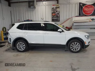2018 Volkswagen Tiguan SEL z VIN 3VV3B7AX1JM167656, wystawiony jako IAAI lot #42658377 z przebiegiem 74 130 mil mil oraz . Historia ofert i sprzedaży dostępna na DreamBid. Obrazek 13.