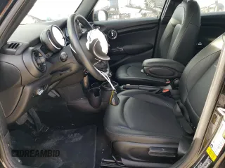 2021 MINI Hardtop 4 Door Oxford Edition with VIN WMWXU7C09M2N79553, listed as a Copart auction lot 84939724 with 59,139 mi miles and Salvage title. Bid and sale history available at DreamBid. Image 7.
