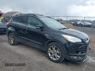 2013 Ford Escape SEL z VIN 1FMCU9HX9DUA69853, wystawiony jako IAAI lot #42037021 z przebiegiem 132 166 mil mil oraz . Historia ofert i sprzedaży dostępna na DreamBid. Obrazek 1.