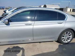 2016 BMW 7 Series 740i with VIN WBA7E2C5XGG739099, listed as a IAAI auction lot 41526038 with 123,900 mi miles. Bid and sale history available at carsss.com. Image 14.