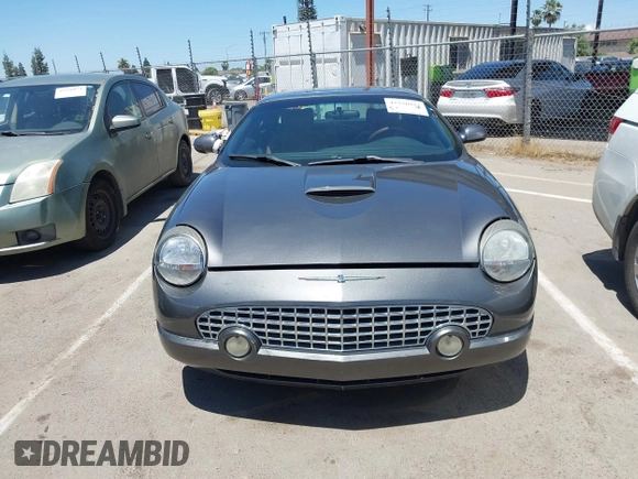 2003 Ford Thunderbird Deluxe z VIN 1FAHP60AX3Y109880, wystawiony jako IAAI lot #42336922 z przebiegiem 213 477 mil mil oraz . Historia ofert i sprzedaży dostępna na DreamBid. Obrazek 12.