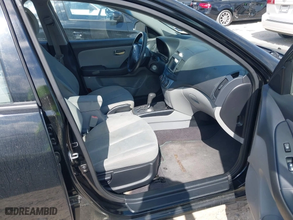 2010 Hyundai Elantra GLS with VIN KMHDU4AD8AU176976, listed as a IAAI auction lot 42044034 with 185,555 mi miles. Bid and sale history available at carsss.com. Image 5.