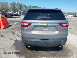 2018 Chevrolet Traverse LT Cloth z VIN 1GNEVGKW4JJ281837, wystawiony jako IAAI lot #41919081 z przebiegiem 91 496 mil mil oraz . Historia ofert i sprzedaży dostępna na DreamBid. Obrazek 16.