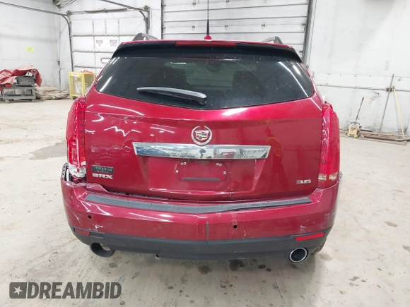 2014 Cadillac SRX Performance Collection z VIN 3GYFNCE30ES596415, wystawiony jako IAAI lot #42329771 z przebiegiem 71 620 mil mil oraz . Historia ofert i sprzedaży dostępna na DreamBid. Obrazek 16.