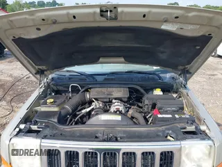 2007 Jeep Commander Sport z VIN 1J8HG48K87C696538, wystawiony jako IAAI lot #39853716 z przebiegiem 226 491 mil mil oraz . Historia ofert i sprzedaży dostępna na DreamBid. Obrazek 10.