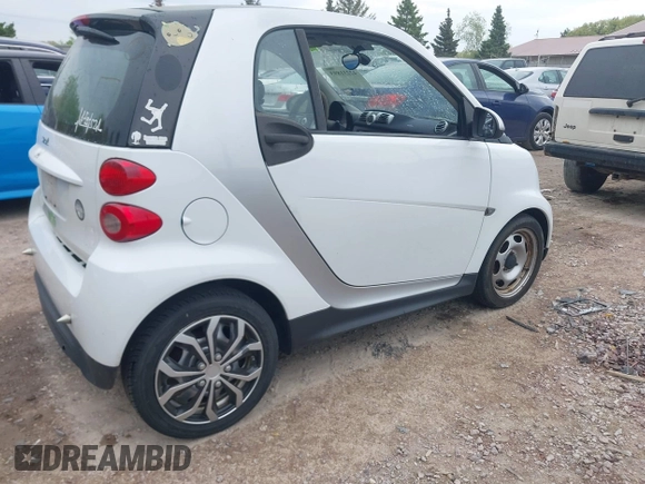 2014 Smart fortwo Pure with VIN WMEEJ3BA5EK749285, listed as a IAAI auction lot 42231893 with 119,507 mi miles and . Bid and sale history available at DreamBid. Image 4.