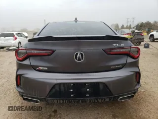 2023 Acura TLX w/A-Spec Package z VIN 19UUB6F5XPA001602, wystawiony jako Copart lot #52938985 z przebiegiem 12 329 mil mil oraz Szkoda całkowita • Salvage title. Historia ofert i sprzedaży dostępna na DreamBid. Obrazek 6.