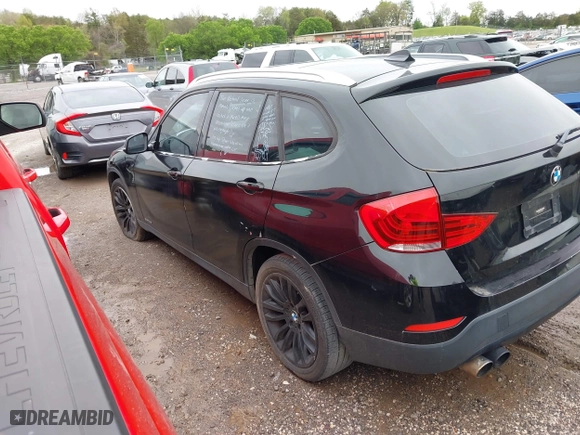 2013 BMW X1 28i with VIN WBAVM1C5XDVW46529, listed as a IAAI auction lot 41975148 with 156,968 mi miles. Bid and sale history available at carsss.com. Image 3.