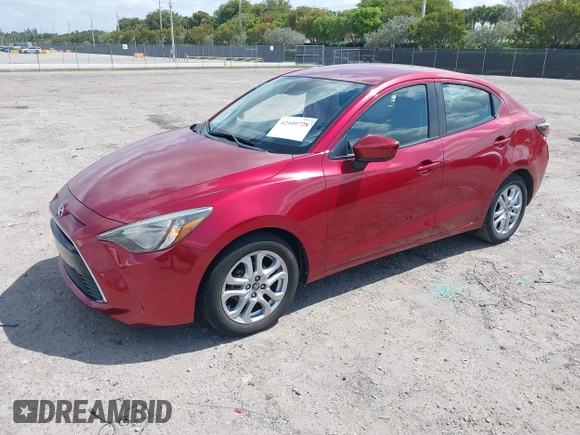 2018 Toyota Yaris with VIN 3MYDLBYV9JY318762, listed as a IAAI auction lot 42109728 with 72,931 mi miles and . Bid and sale history available at DreamBid. Image 2.