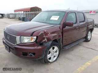2014 Honda Ridgeline RTL with VIN 5FPYK1F52EB010700, listed as a IAAI auction lot 41490401 with 180,947 mi miles. Bid and sale history available at carsss.com. Image 2.