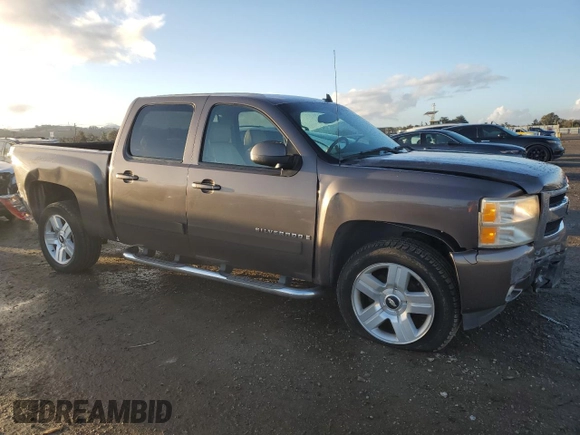 2007 Chevrolet Silverado 1500 Work Truck with VIN 2GCEC13J571550686, listed as a Copart auction lot 86720974 with 141,136 mi miles and Salvage Title. Bid and sale history available at DreamBid. Image 4.
