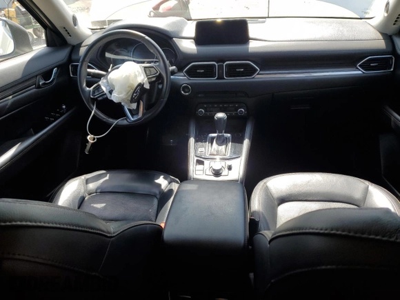 2020 Mazda CX-5 Grand Touring with VIN JM3KFBDM7L1851699, listed as a Copart auction lot 56475715 with Not Provided miles and Salvage Title. Bid and sale history available at DreamBid. Image 8.