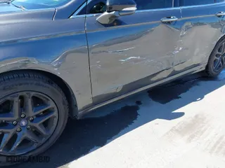 2016 Ford Fusion Titanium with VIN 3FA6P0K95GR180318, listed as a IAAI auction lot 41981274 with 146,875 mi miles. Bid and sale history available at carsss.com. Image 6.