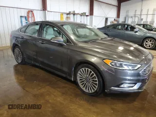 2017 Ford Fusion Titanium z VIN 3FA6P0D93HR303905, wystawiony jako Copart lot #63621745 z przebiegiem 120 249 mil mil oraz Szkoda całkowita • Salvage title. Historia ofert i sprzedaży dostępna na DreamBid. Obrazek 4.