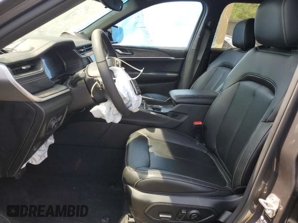 2024 Jeep Grand Cherokee Limited with VIN 1C4RJKBG6R8501418, listed as a Copart auction lot 59668615 with 9,663 mi miles and Salvage title. Bid and sale history available at DreamBid. Image 7.