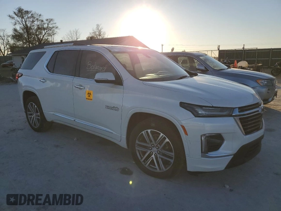 2023 Chevrolet Traverse High Country with VIN 1GNEVNKWXPJ334098, listed as a Copart auction lot 84103304 with 10,977 mi miles and Salvage title. Bid and sale history available at DreamBid. Image 4.