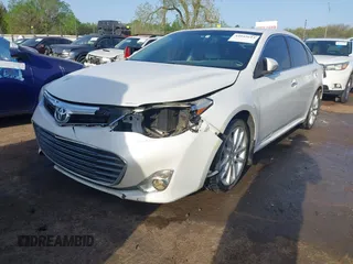 2013 Toyota Avalon XLE with VIN 4T1BK1EB8DU065806, listed as a IAAI auction lot 42043614 with 197,049 mi miles and . Bid and sale history available at DreamBid. Image 2.