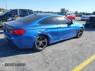 2015 BMW 4 Series 428i xDrive with VIN WBA3N9C57FK247763, listed as a IAAI auction lot 41783892 with 158,813 mi miles and . Bid and sale history available at DreamBid. Image 4.
