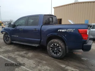 2018 Nissan Titan Pro-4X z VIN 1N6AA1E55JN505223, wystawiony jako Copart lot #85542844 z przebiegiem 113 601 mil mil oraz Szkoda całkowita • Salvage title. Historia ofert i sprzedaży dostępna na DreamBid. Obrazek 2.