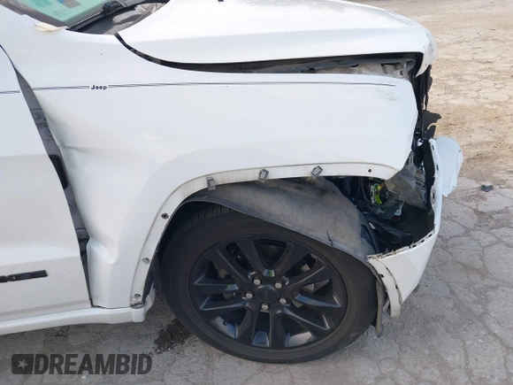 2017 Jeep Grand Cherokee Laredo with VIN 1C4RJEAG1HC720656, listed as a IAAI auction lot 42263500 with 184,239 mi miles and . Bid and sale history available at DreamBid. Image 6.