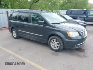2012 Chrysler Town & Country Touring with VIN 2C4RC1BG1CR312532, listed as a IAAI auction lot 42194864 with 197,609 mi miles and . Bid and sale history available at DreamBid. Image 1.