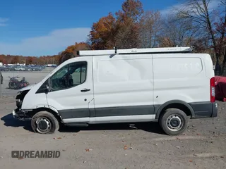 2023 Ford Transit Cargo with VIN 1FTBR1Y86PKA79798, listed as a IAAI auction lot 40155361 with 28,670 mi miles and . Bid and sale history available at DreamBid. Image 13.