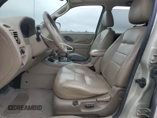 2005 Ford Escape Limited z VIN 1FMYU04195KB37679, wystawiony jako Copart lot #50656585 z przebiegiem 218 891 mil mil oraz Szkoda całkowita • Salvage title. Historia ofert i sprzedaży dostępna na DreamBid. Obrazek 7.