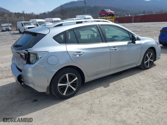 2022 Subaru Impreza Premium with VIN 4S3GTAV6XN3704964, listed as a IAAI auction lot 41779191 with 34,130 mi miles. Bid and sale history available at carsss.com. Image 4.