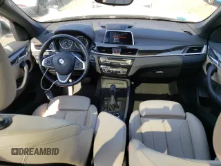 2018 BMW X1 xDrive28i z VIN WBXHT3C35J5F89977, wystawiony jako Copart lot #58464345 z przebiegiem 45 468 mil mil oraz Szkody całkowita. Historia ofert i sprzedaży dostępna na DreamBid. Obrazek 8.
