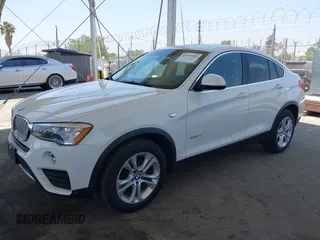 2015 BMW X4 xDrive28i with VIN 5UXXW3C5XF0M89259, listed as a IAAI auction lot 42553903 with 98,960 mi miles and . Bid and sale history available at DreamBid. Image 14.