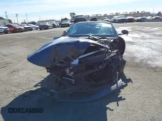 2024 Aston Martin DB12 z VIN SCFRMFGWXRGM13607, wystawiony jako IAAI lot #41380304 z przebiegiem Nie podano mil oraz . Historia ofert i sprzedaży dostępna na DreamBid. Obrazek 12.