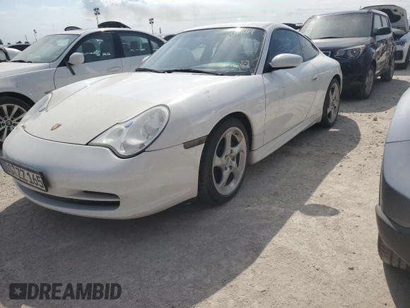 2004 Porsche 911 Carrera z VIN WP0AA29904S622574, wystawiony jako Copart lot #76657664 z przebiegiem Nie podano mil oraz Szkoda całkowita • Salvage title. Historia ofert i sprzedaży dostępna na DreamBid. Obrazek 1.