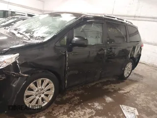 2012 Toyota Sienna LE with VIN 5TDJK3DC1CS036110, listed as a IAAI auction lot 41943807 with 255,111 mi miles. Bid and sale history available at carsss.com. Image 14.