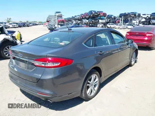 2018 Ford Fusion Hybrid S with VIN 3FA6P0UU3JR122443, listed as a IAAI auction lot 41898129 with 119,873 mi miles. Bid and sale history available at carsss.com. Image 4.