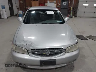 2001 Nissan Altima GXE with VIN 1N4DL01D71C241084, listed as a IAAI auction lot 41935585 with 136,114 mi miles. Bid and sale history available at carsss.com. Image 12.