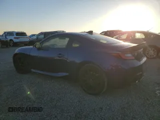 2023 Toyota 86 Premium z VIN JF1ZNBE11P9750749, wystawiony jako Copart lot #47240095 z przebiegiem 17 985 mil mil oraz Tytuł czysty. Historia ofert i sprzedaży dostępna na DreamBid. Obrazek 2.