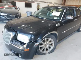 2006 Chrysler 300 C with VIN 2C3KA63H06H421414, listed as a IAAI auction lot 42144274 with 118,692 mi miles. Bid and sale history available at carsss.com. Image 12.