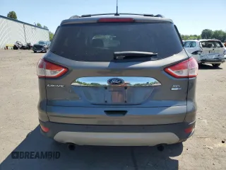 2013 Ford Escape SEL with VIN 1FMCU9HX1DUC79086, listed as a Copart auction lot 57312515 with 124,928 mi miles and Salvage title. Bid and sale history available at DreamBid. Image 6.