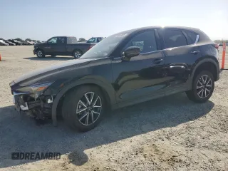2018 Mazda CX-5 Grand Touring z VIN JM3KFBDM0J0399985, wystawiony jako Copart lot #54097665 z przebiegiem 45 344 mil mil oraz Szkoda całkowita • Salvage title. Historia ofert i sprzedaży dostępna na DreamBid. Obrazek 1.