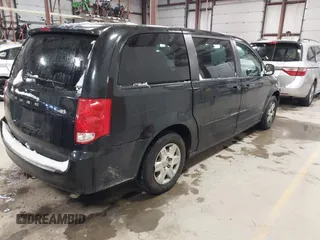 2012 Dodge Grand Caravan SE with VIN 2C4RDGBG8CR155758, listed as a IAAI auction lot 41300951 with 126,209 mi miles and . Bid and sale history available at DreamBid. Image 4.