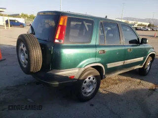 1999 Honda CR-V LX with VIN JHLRD1849XC083285, listed as a Copart auction lot 59909904 with 127,759 mi miles and Salvage Title. Bid and sale history available at carsss.com. Image 3.