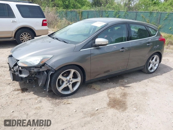 2014 Ford Focus Titanium with VIN 1FADP3N20EL422693, listed as a IAAI auction lot 42060024 with 97,371 mi miles and . Bid and sale history available at DreamBid. Image 2.