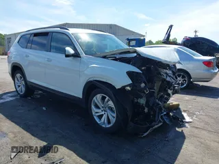 2021 Volkswagen Atlas SE z VIN 1V2HR2CA1MC551176, wystawiony jako IAAI lot #42096369 z przebiegiem 80 876 mil mil oraz . Historia ofert i sprzedaży dostępna na DreamBid. Obrazek 1.