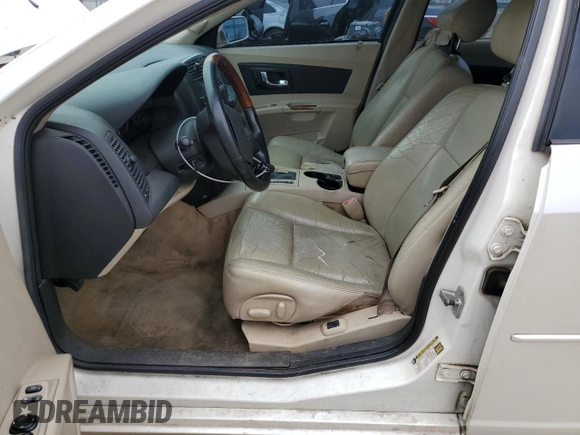2004 Cadillac CTS with VIN 1G6DM577240182976, listed as a Copart auction lot 71223694 with 232,452 mi miles and Salvage Title. Bid and sale history available at DreamBid. Image 7.