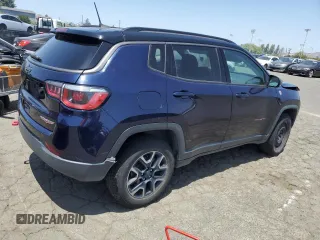 2019 Jeep Compass Trailhawk z VIN 3C4NJDDB0KT721477, wystawiony jako Copart lot #59374765 z przebiegiem 114 052 mil mil oraz Czysty tytuł • Clean title. Historia ofert i sprzedaży dostępna na DreamBid. Obrazek 3.